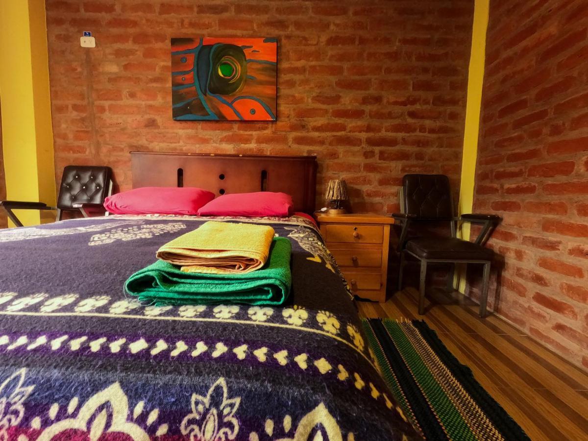 Hostal La Casa Amarilla City Баньос Экстерьер фото