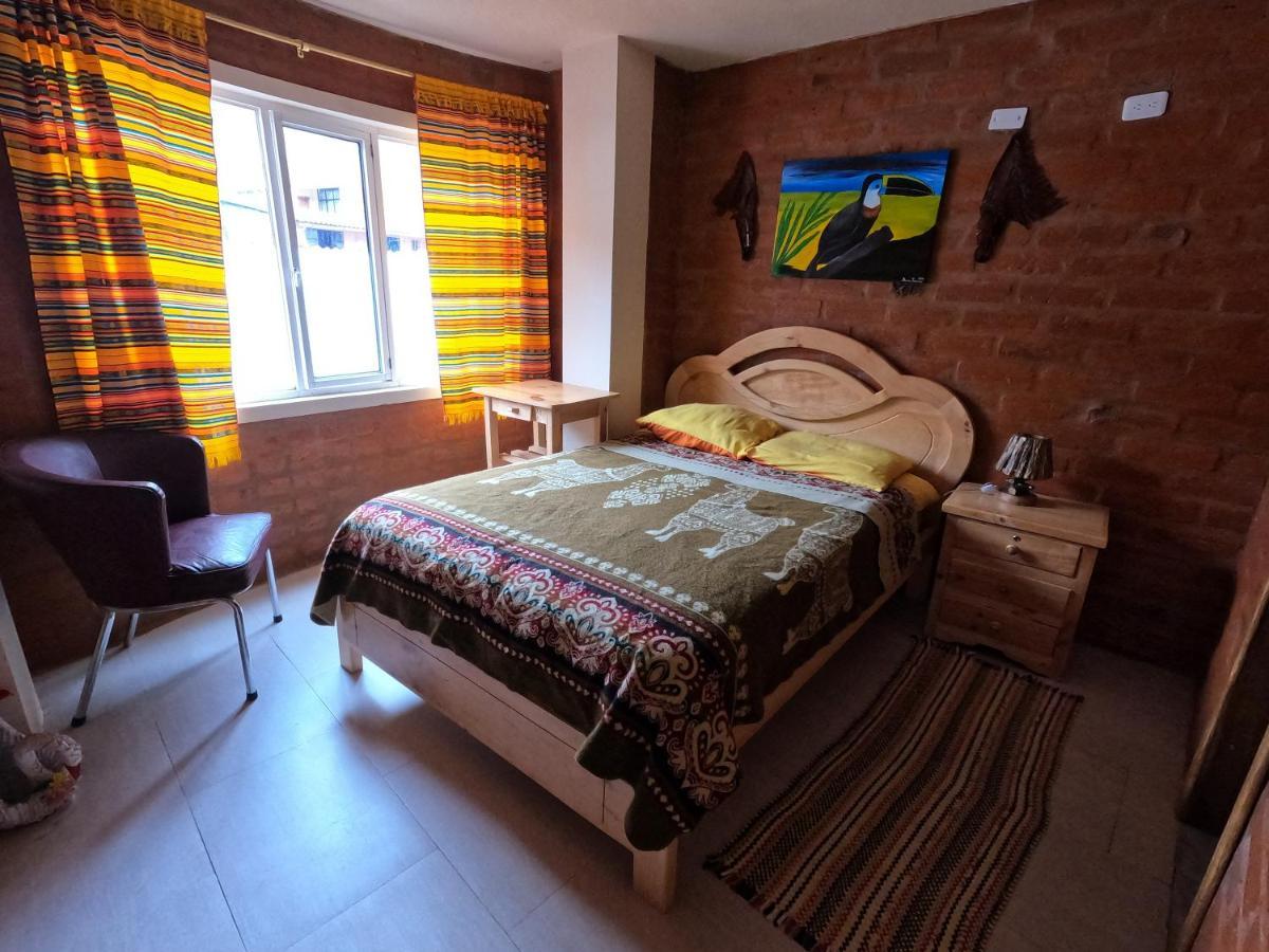 Hostal La Casa Amarilla City Баньос Экстерьер фото