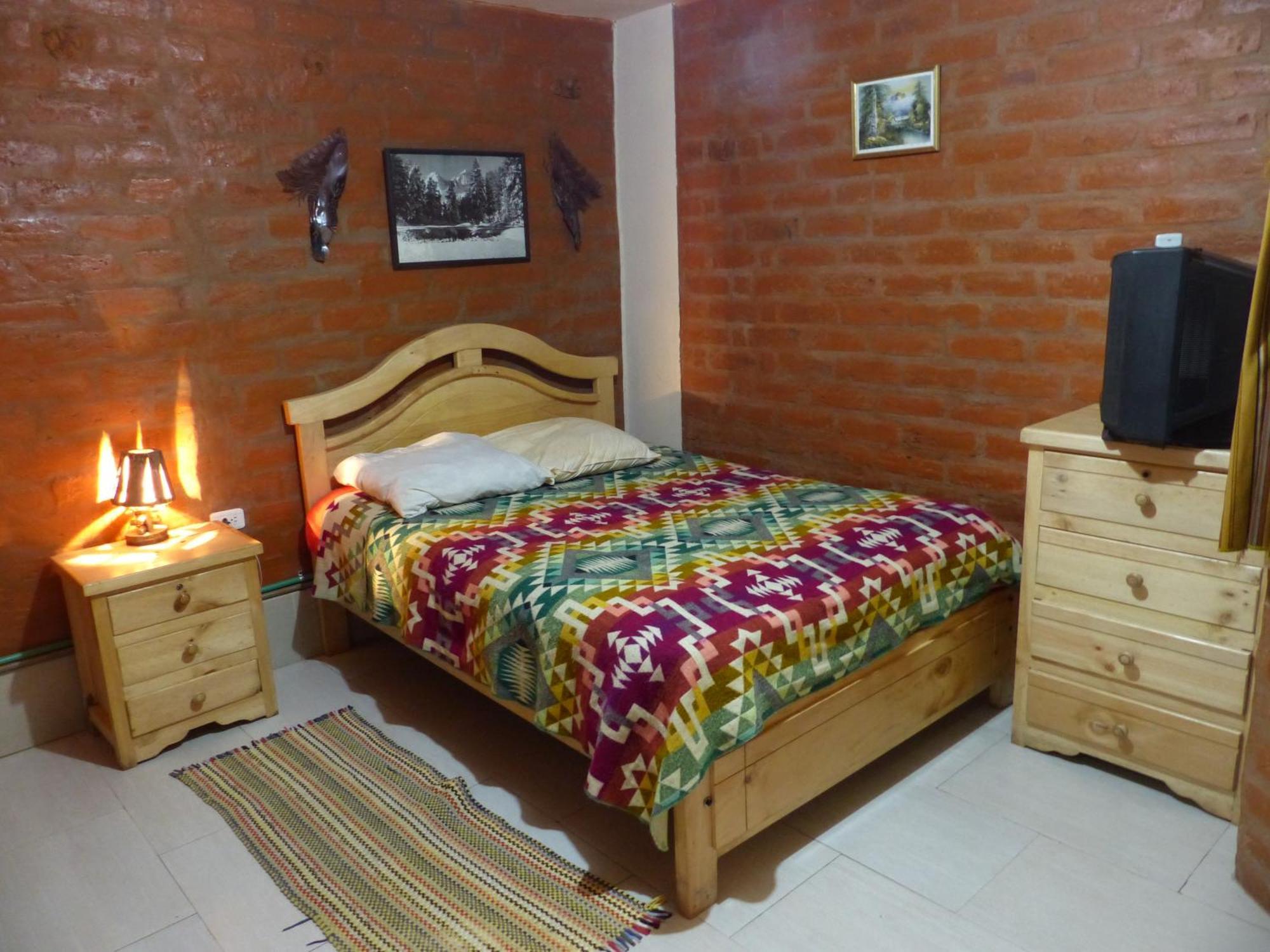 Hostal La Casa Amarilla City Баньос Экстерьер фото