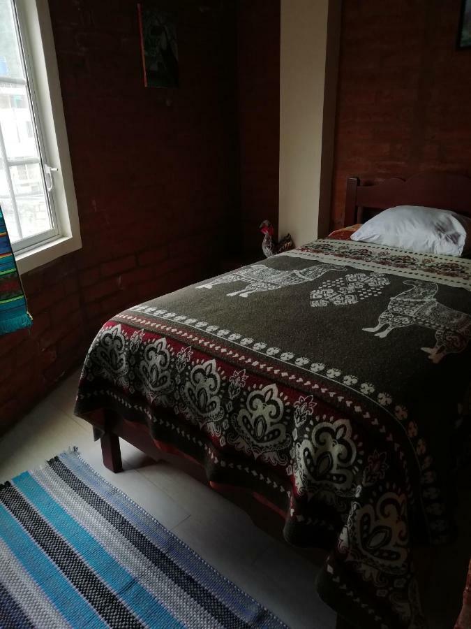 Hostal La Casa Amarilla City Баньос Экстерьер фото