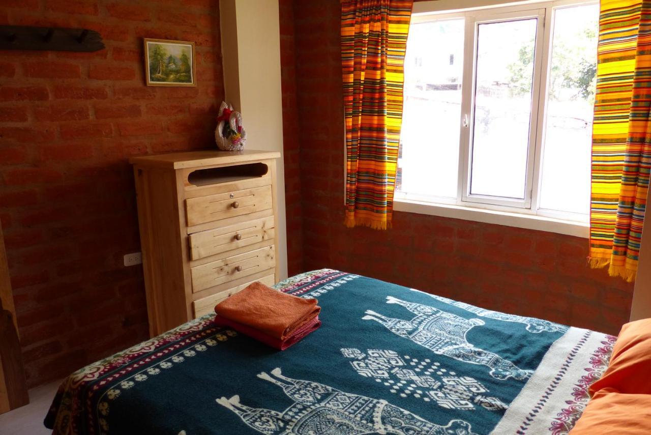 Hostal La Casa Amarilla City Баньос Экстерьер фото