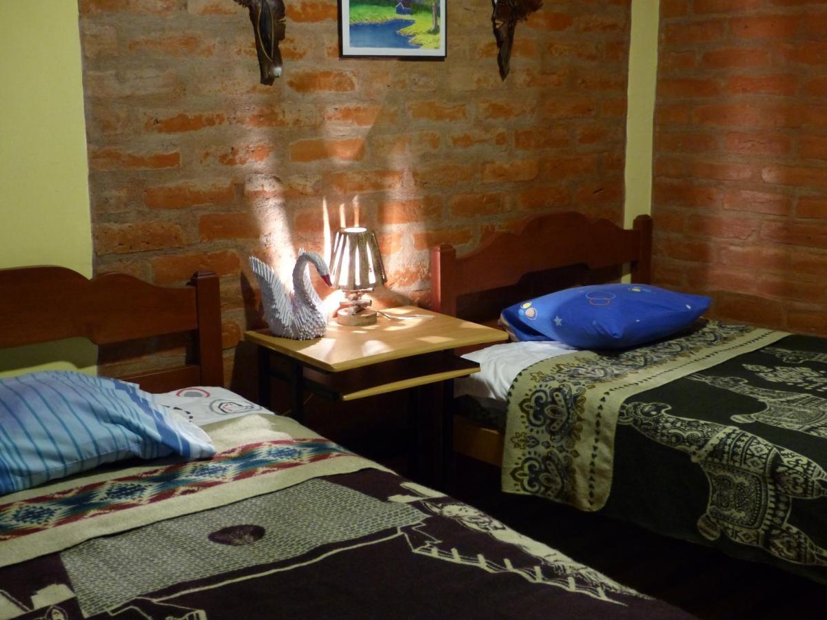 Hostal La Casa Amarilla City Баньос Экстерьер фото