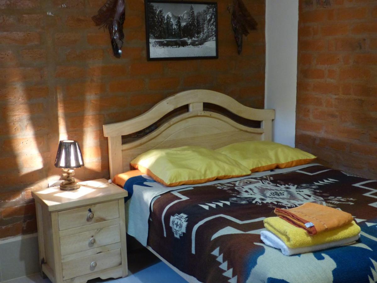 Hostal La Casa Amarilla City Баньос Экстерьер фото